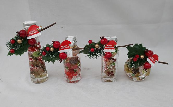 サンタの帽子つきのクリスマスハーバリウムと赤を基調とした迎春ハーバリウム　Sサイズおまかせ2本セット ｜ インテリア 植物 お花 お正月 イベント 冬 鮮やか 鑑賞 手入れ不要 ガラス 癒し ※離島への配送不可 ※2025年12月中旬～12月下旬頃に順次発送予定